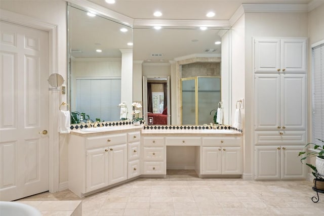 2319 Woodway Dr, Round Rock, TX 78681 - full bathroom featuring crown molding, vanity, a shower stall, recessed lighting, and tile patterned flooring
