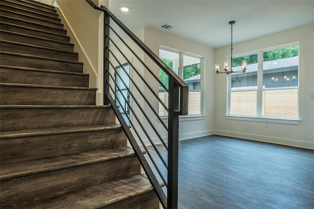 2009 Iroquois Ln Unit B, Austin, TX 78741 - stairs with wood finished floors, a chandelier, and recessed lighting