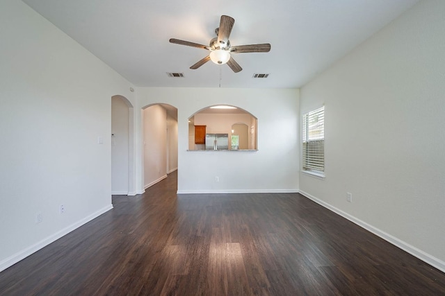 18111 Gallant St, Manor, TX 78653 - unfurnished living room featuring ceiling fan and dark wood finished floors