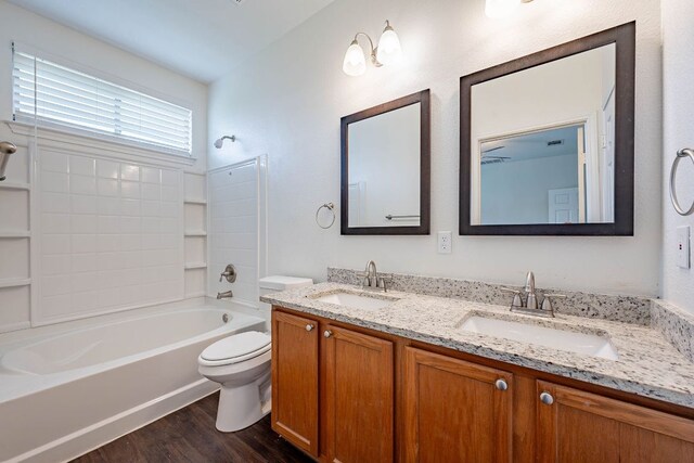 18111 Gallant St, Manor, TX 78653 - full bath with wood finished floors, double vanity, and shower / bathtub combination
