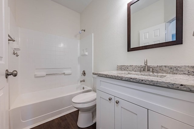 18111 Gallant St, Manor, TX 78653 - bathroom featuring vanity, wood finished floors, and shower / bathtub combination