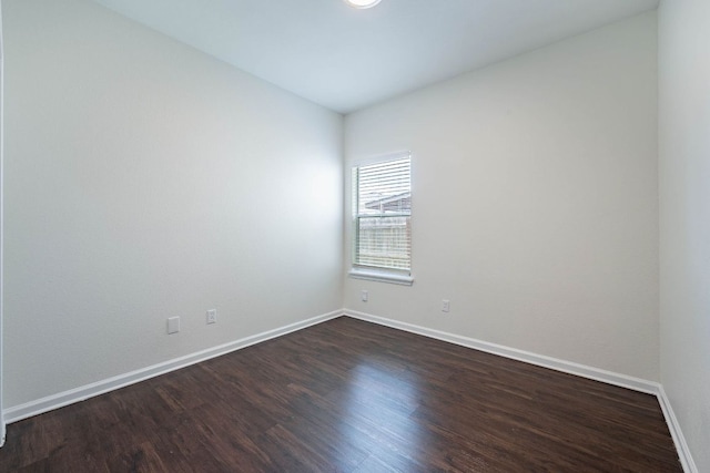 18111 Gallant St, Manor, TX 78653 - unfurnished room with dark wood-type flooring