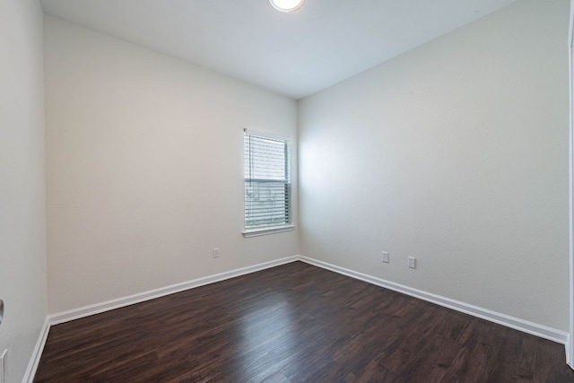 18111 Gallant St, Manor, TX 78653 - spare room featuring dark wood-type flooring