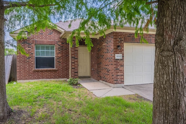 18111 Gallant St, Manor, TX 78653 - ranch-style house featuring brick siding and an attached garage