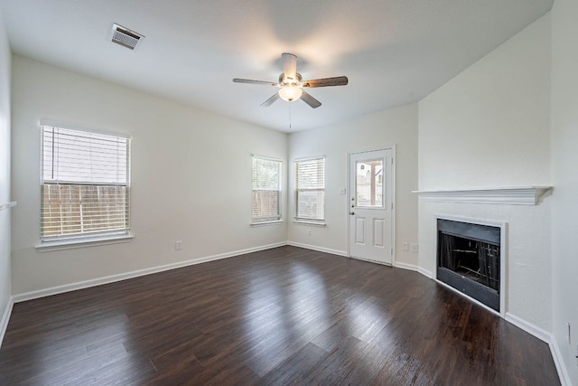 18111 Gallant St, Manor, TX 78653 - unfurnished living room featuring a ceiling fan, wood finished floors, and a fireplace