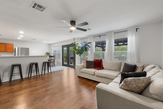 216 Prairie Verbena Dr, Kyle, TX 78640 - living room with a ceiling fan, wood finished floors, and recessed lighting