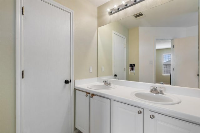 216 Prairie Verbena Dr, Kyle, TX 78640 - full bathroom featuring double vanity