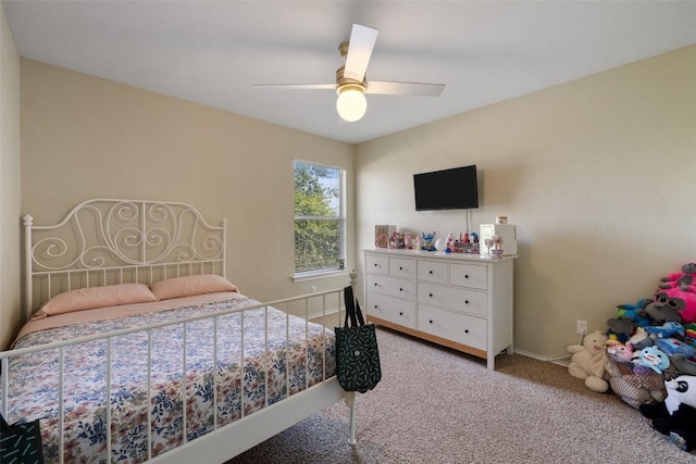 216 Prairie Verbena Dr, Kyle, TX 78640 - carpeted bedroom featuring a ceiling fan and baseboards