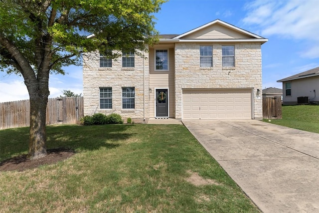 216 Prairie Verbena Dr, Kyle, TX 78640 - view of front facade featuring stone siding, a garage, and driveway