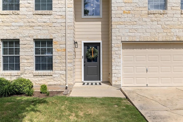 216 Prairie Verbena Dr, Kyle, TX 78640 - entrance to property with stone siding and a garage