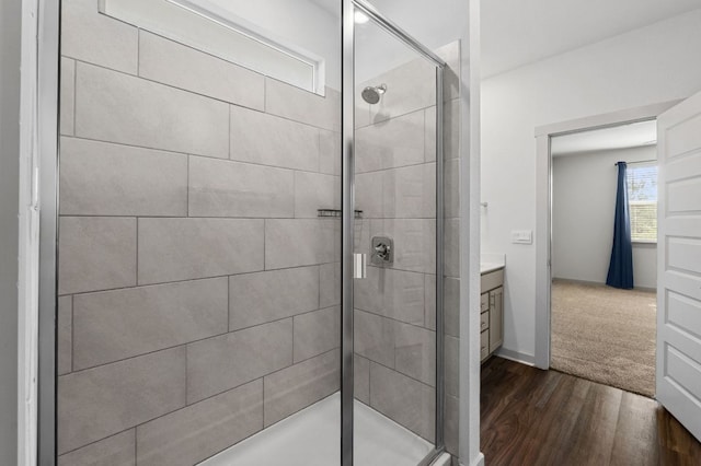 7514 Daves Landing Dr, Austin, TX 78724 - full bath with a stall shower, wood finished floors, and vanity