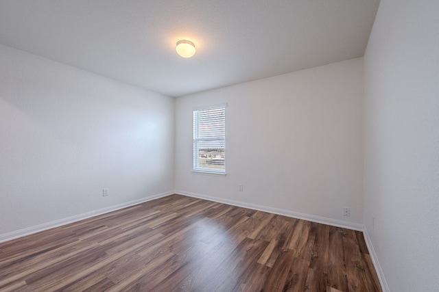 20016 Woodrow Wilson St, Manor, TX 78653 - unfurnished room featuring dark wood finished floors and baseboards