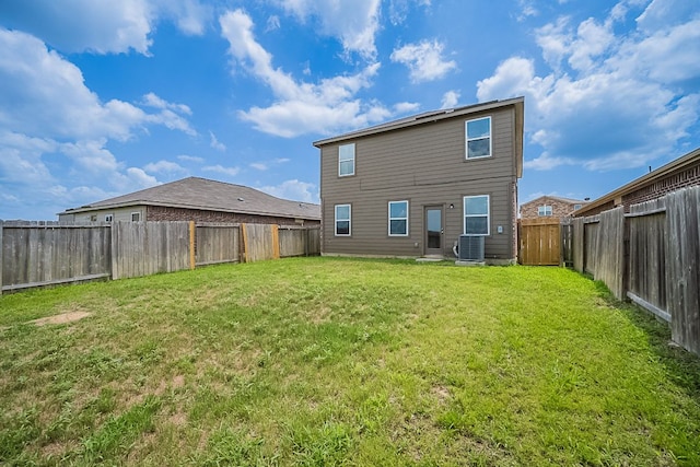 20016 Woodrow Wilson St, Manor, TX 78653 - rear view of house featuring a fenced backyard
