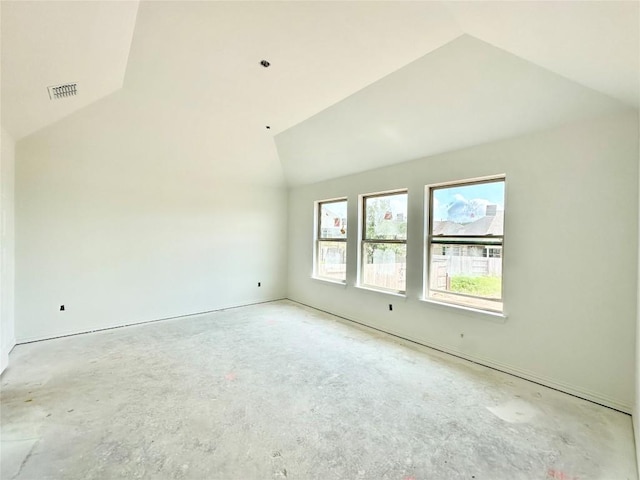 236 Du Bois Ln, Kyle, TX 78640 - spare room featuring lofted ceiling and unfinished concrete flooring