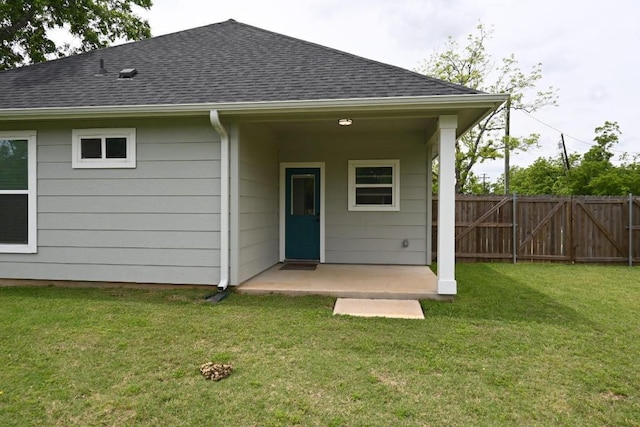 215 E 8th St, Elgin, TX 78621 - rear view of house featuring a shingled roof