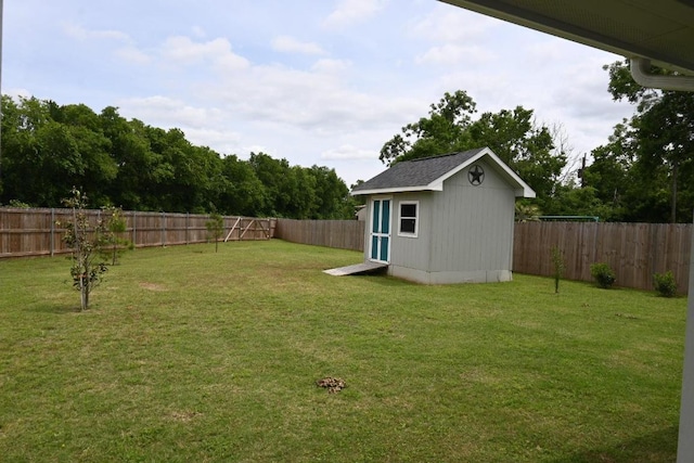 215 E 8th St, Elgin, TX 78621 - fenced backyard featuring a shed