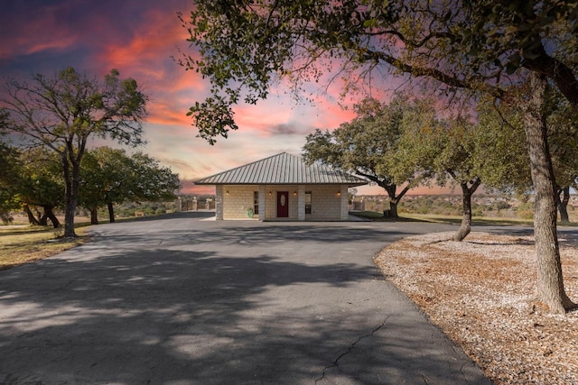 8300 Money Pit Rd, Killeen, TX 76542 - view of front of home featuring driveway and a metal roof