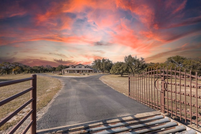8300 Money Pit Rd, Killeen, TX 76542 - view of asphalt driveway featuring a gated entry