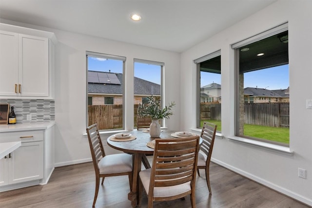 2437 Burberry Ln, Leander, TX 78641 - dining room featuring healthy amount of natural light, light wood-style flooring, and recessed lighting