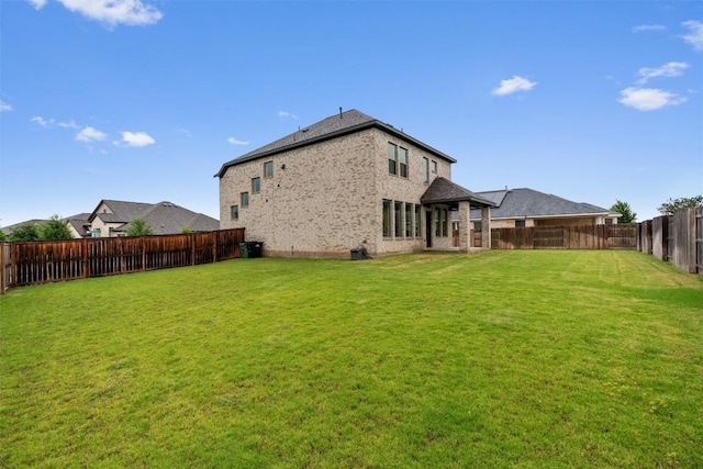 2437 Burberry Ln, Leander, TX 78641 - back of house featuring a fenced backyard