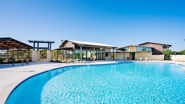 2437 Burberry Ln, Leander, TX 78641 - community pool with a patio area