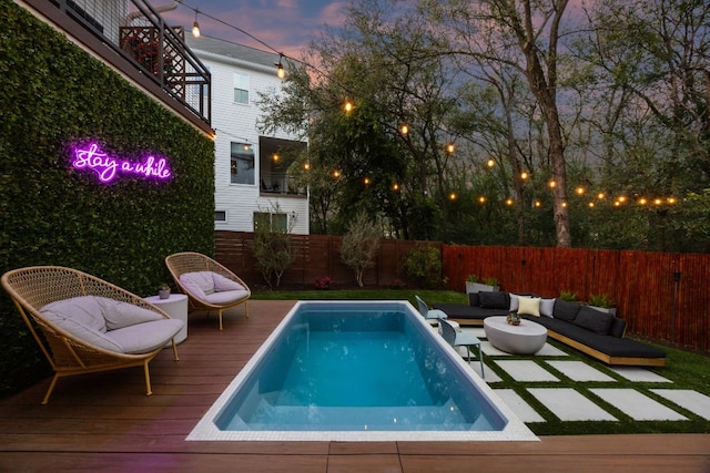 5703 Taunton Dr, Austin, TX 78723 - view of swimming pool featuring an outdoor hangout area, a deck, and a fenced backyard