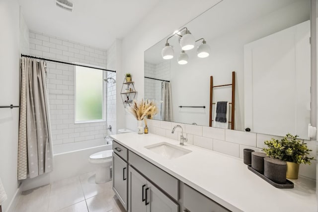 5703 Taunton Dr, Austin, TX 78723 - bathroom with vanity, shower / tub combo with curtain, and tile patterned floors