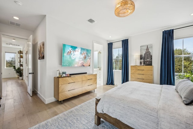 5703 Taunton Dr, Austin, TX 78723 - bedroom with light wood-type flooring and recessed lighting