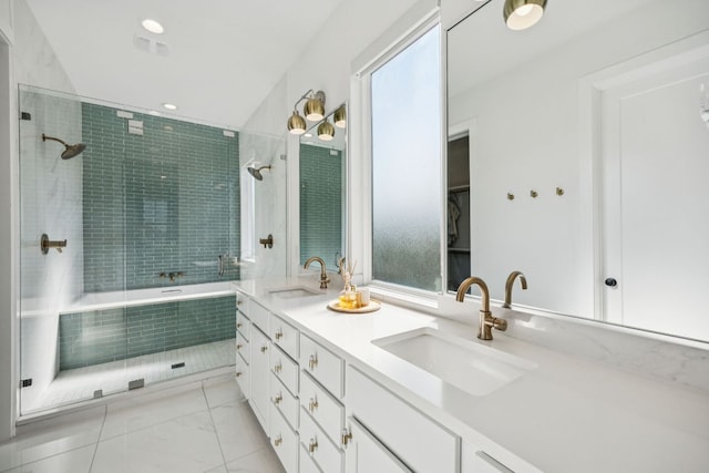 5703 Taunton Dr, Austin, TX 78723 - bathroom with double vanity, tiled shower / bath, and recessed lighting