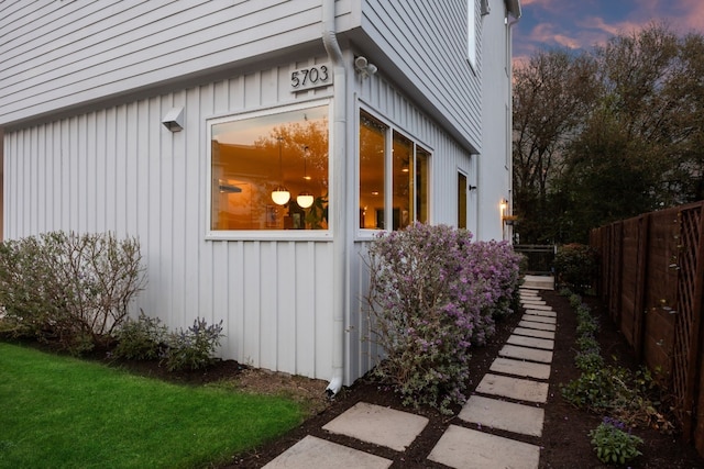 5703 Taunton Dr, Austin, TX 78723 - property exterior at dusk featuring board and batten siding