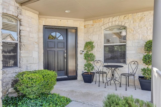 5511 Oakwood Cv Unit B, Austin, TX 78731 - doorway to property featuring stone siding