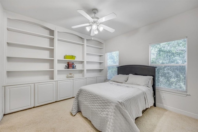 5511 Oakwood Cv Unit B, Austin, TX 78731 - bedroom featuring light carpet and ceiling fan