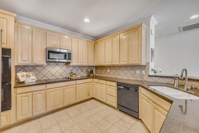 5511 Oakwood Cv Unit B, Austin, TX 78731 - kitchen with black appliances, light tile patterned flooring, decorative backsplash, light brown cabinetry, and ornamental molding