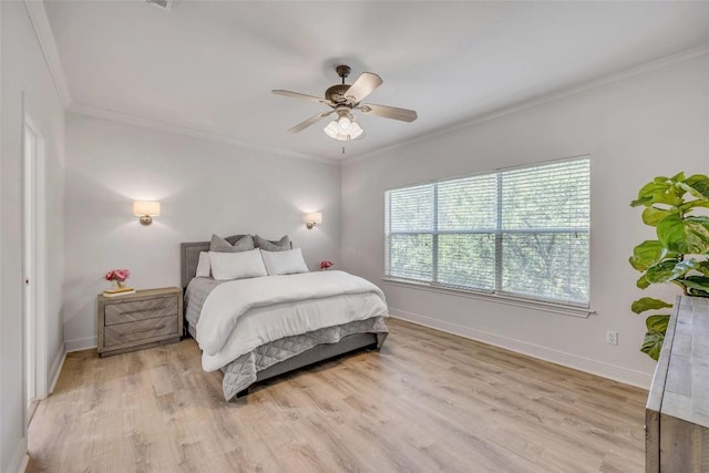 5511 Oakwood Cv Unit B, Austin, TX 78731 - bedroom featuring light wood-type flooring, ornamental molding, and a ceiling fan