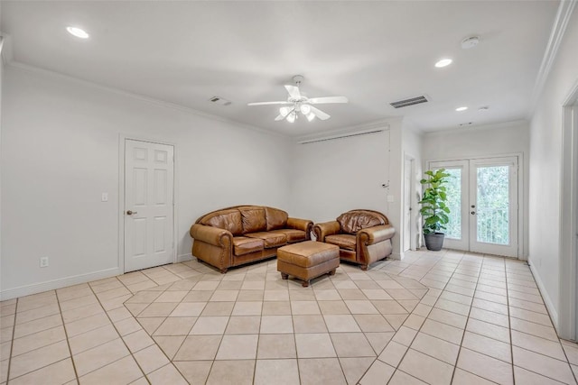5511 Oakwood Cv Unit B, Austin, TX 78731 - living area with light tile patterned floors, french doors, a ceiling fan, recessed lighting, and crown molding