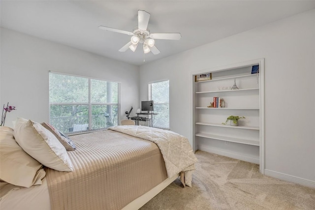 5511 Oakwood Cv Unit B, Austin, TX 78731 - bedroom featuring light carpet and ceiling fan