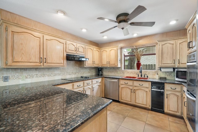 11923 Brookwood Cir, Austin, TX 78750 - kitchen with appliances with stainless steel finishes, under cabinet range hood, light brown cabinets, tasteful backsplash, and recessed lighting