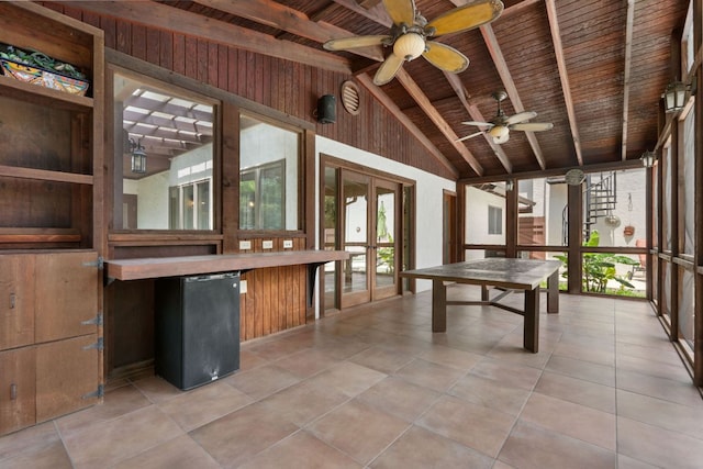 11923 Brookwood Cir, Austin, TX 78750 - recreation room with wooden ceiling, ceiling fan, healthy amount of natural light, and light tile patterned floors