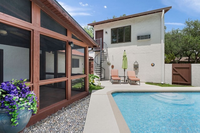 11923 Brookwood Cir, Austin, TX 78750 - view of pool with a patio area, a gate, a sunroom, and stairway
