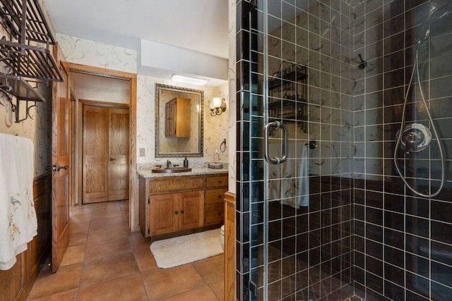 11923 Brookwood Cir, Austin, TX 78750 - bathroom featuring a stall shower, vanity, and tile patterned floors