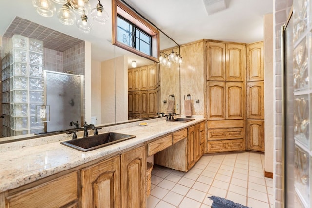 11923 Brookwood Cir, Austin, TX 78750 - bathroom featuring tile patterned flooring, double vanity, a stall shower, and a chandelier