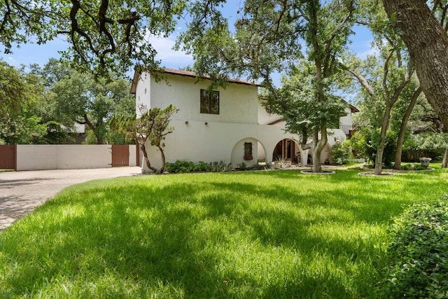 11923 Brookwood Cir, Austin, TX 78750 - mediterranean / spanish home with stucco siding