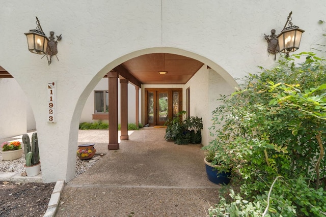 11923 Brookwood Cir, Austin, TX 78750 - view of exterior entry with stucco siding and french doors