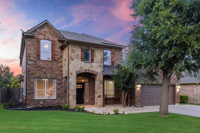 1000 Williams Way, Cedar Park, TX 78613 - view of front of house featuring concrete driveway, a standing seam roof, brick siding, roof with shingles, and stone siding