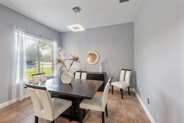 1000 Williams Way, Cedar Park, TX 78613 - dining space featuring baseboards and light stone finish flooring