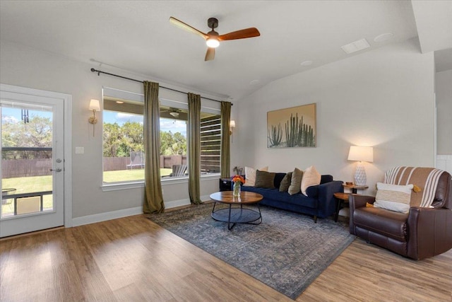 496 Sawtooth Mountain Way, Dripping Springs, TX 78620 - living area featuring a ceiling fan, wood finished floors, and vaulted ceiling