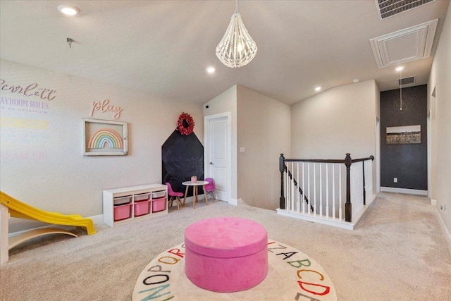 496 Sawtooth Mountain Way, Dripping Springs, TX 78620 - rec room with attic access, carpet flooring, vaulted ceiling, and recessed lighting