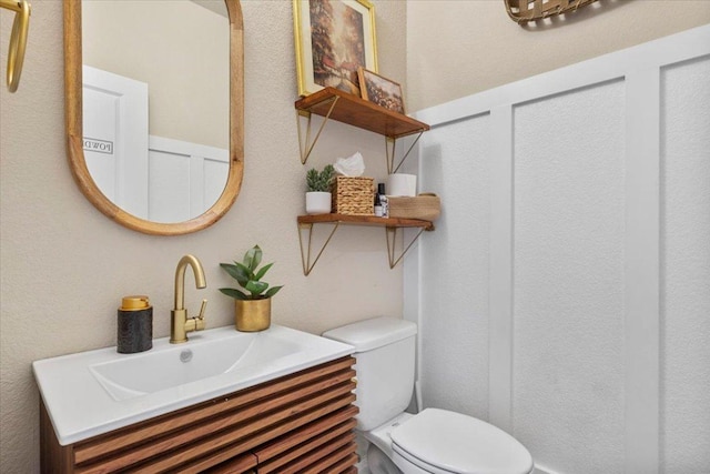 496 Sawtooth Mountain Way, Dripping Springs, TX 78620 - bathroom featuring vanity and toilet