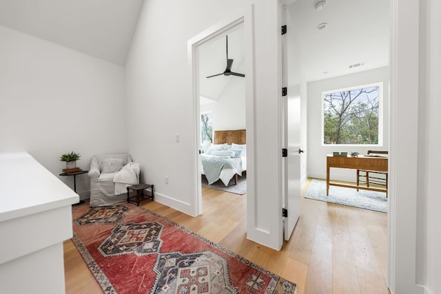 1703 Miami Dr, Austin, TX 78733 - hall with light wood-style flooring and high vaulted ceiling