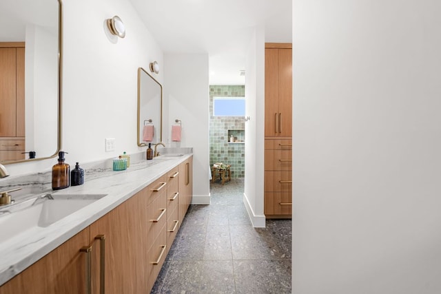 1703 Miami Dr, Austin, TX 78733 - bathroom featuring double vanity and tiled shower
